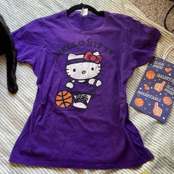 Hello Kitty Tops - SOLD LIVE 10/19/24 
Hello Kitty Basketball Tee one small pinhole in back